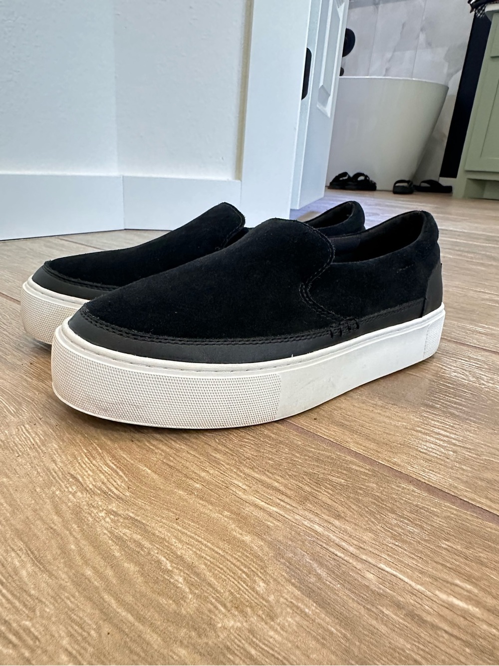 UGG Men's Black Suede Slip-On Sneakers with White Platform Sole